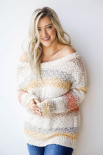 mode, survivor stripes sweater