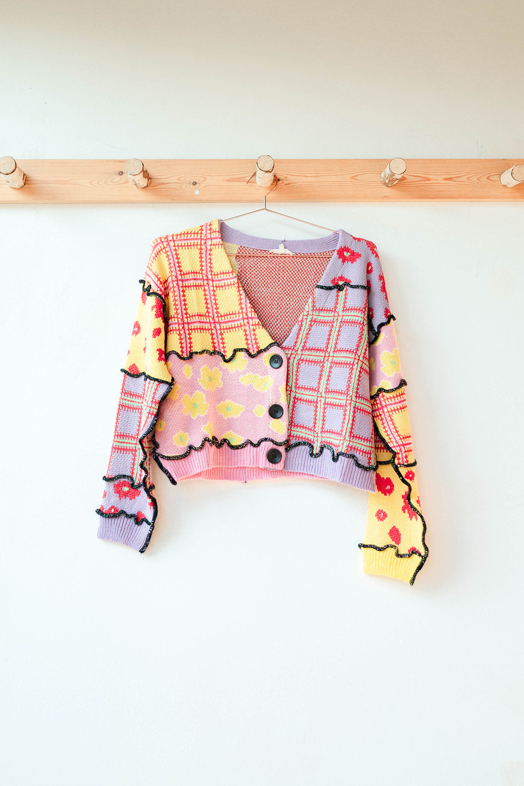 mode, we got a letter knit top