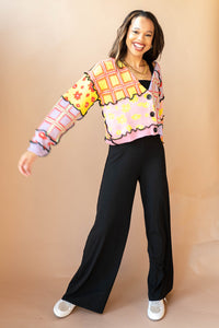 mode, we got a letter knit top