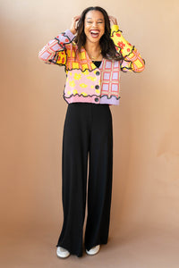 mode, we got a letter knit top