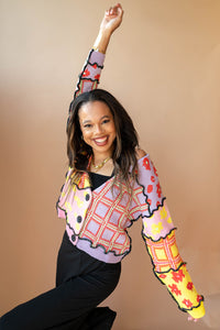 mode, we got a letter knit top
