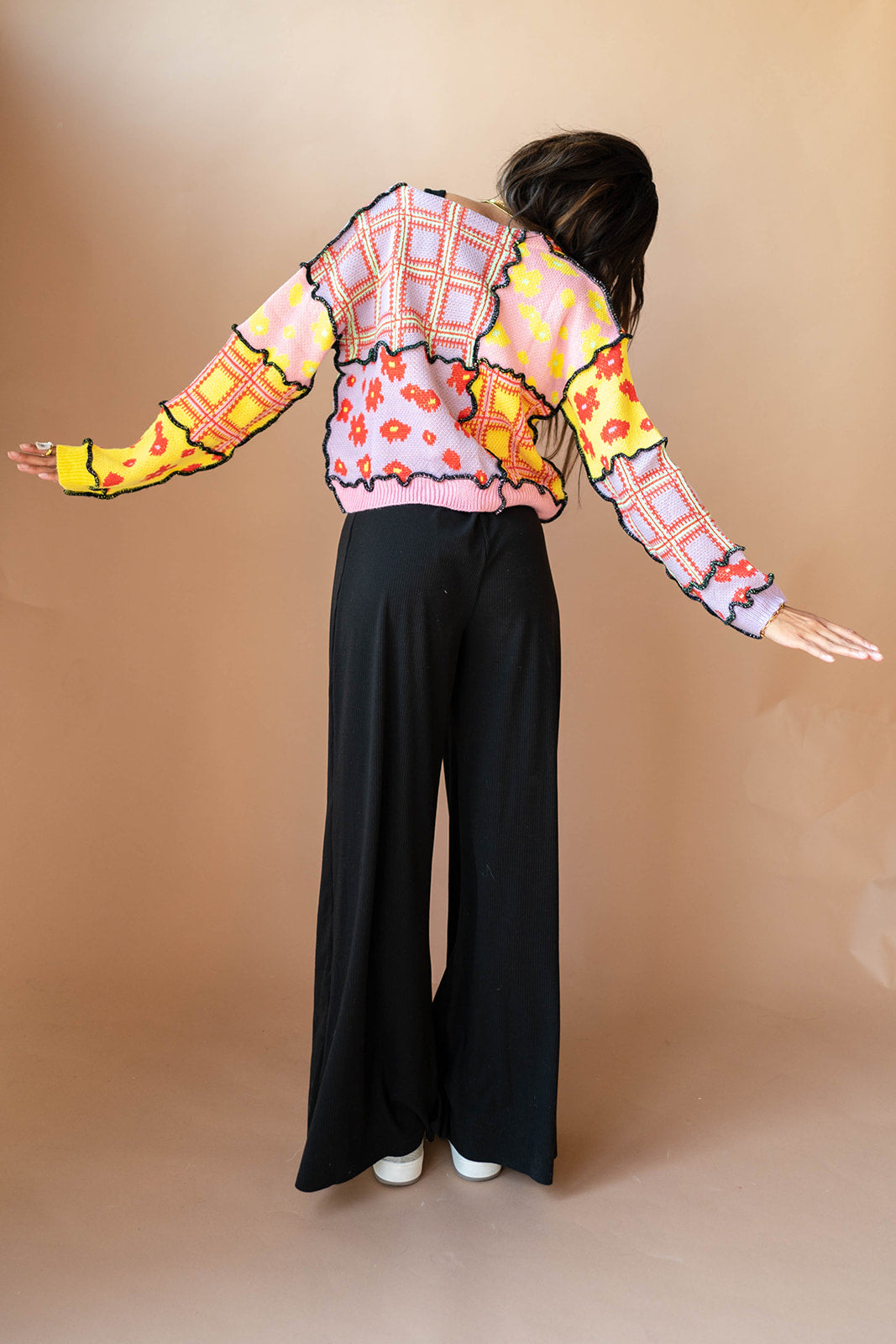 mode, we got a letter knit top
