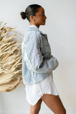 mode, pearls are always appropriate jacket