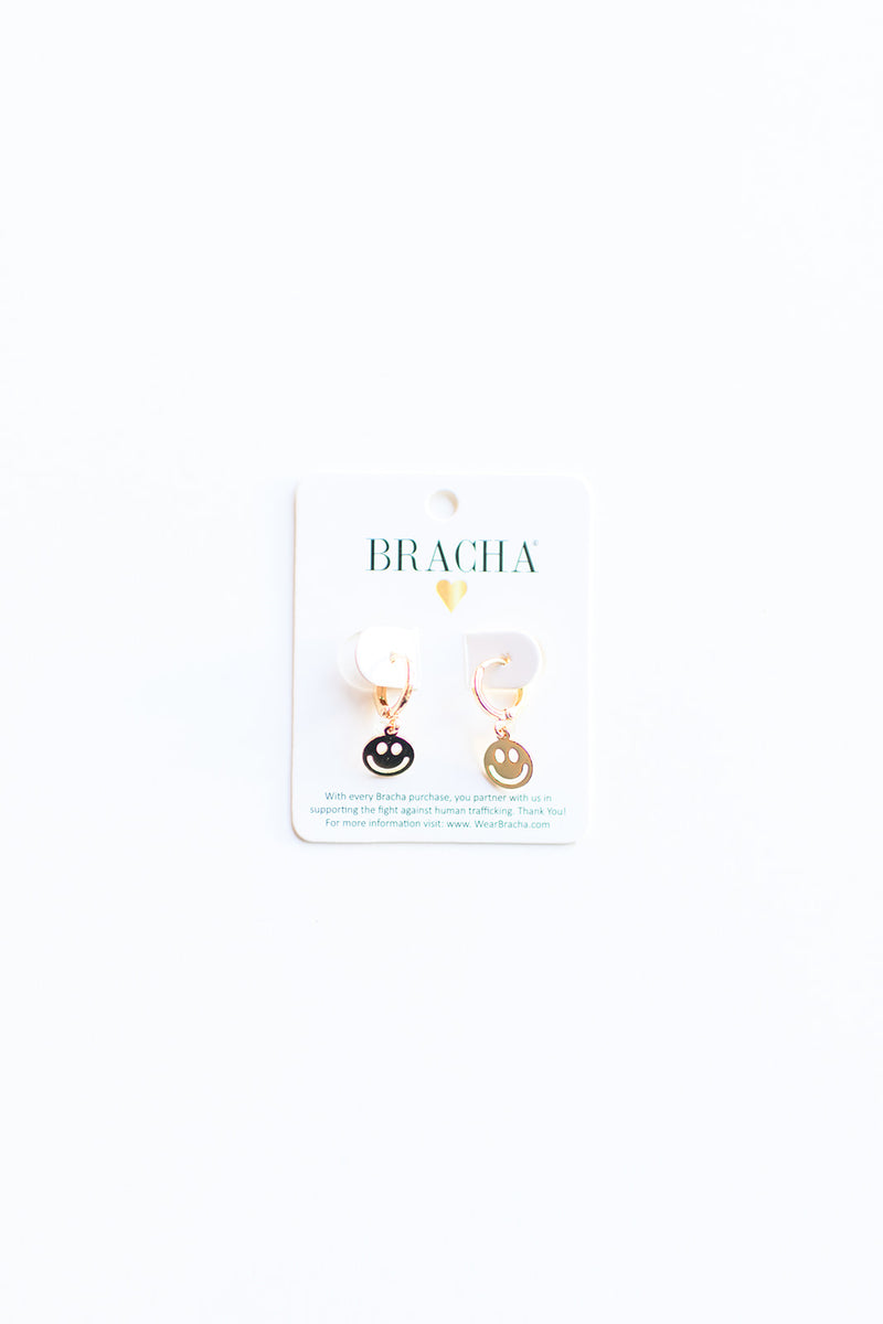 smiley huggies earrings