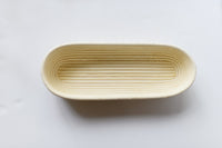 mode, woven rattan baguette basket