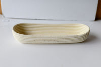 mode, woven rattan baguette basket