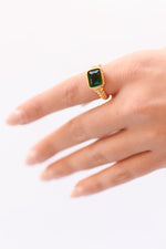mode, braided emerald gem ring