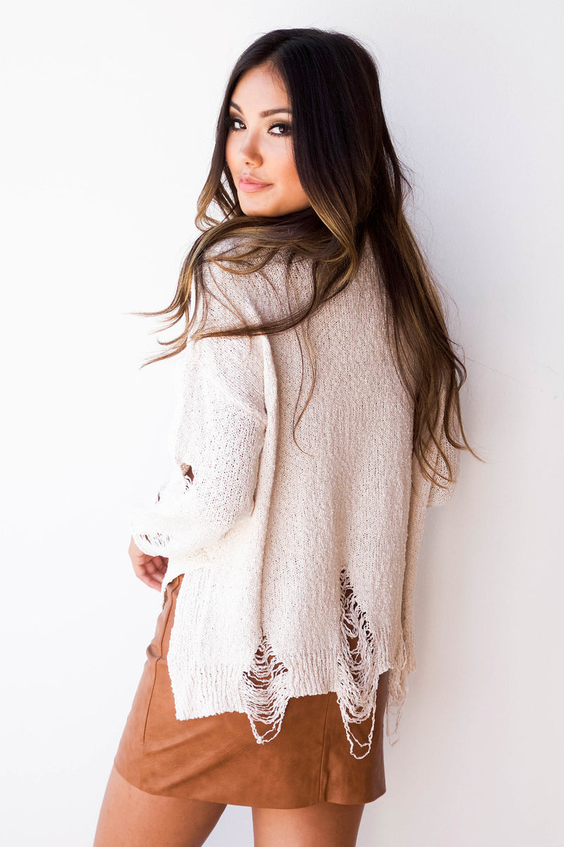 mode, not distraught sweater