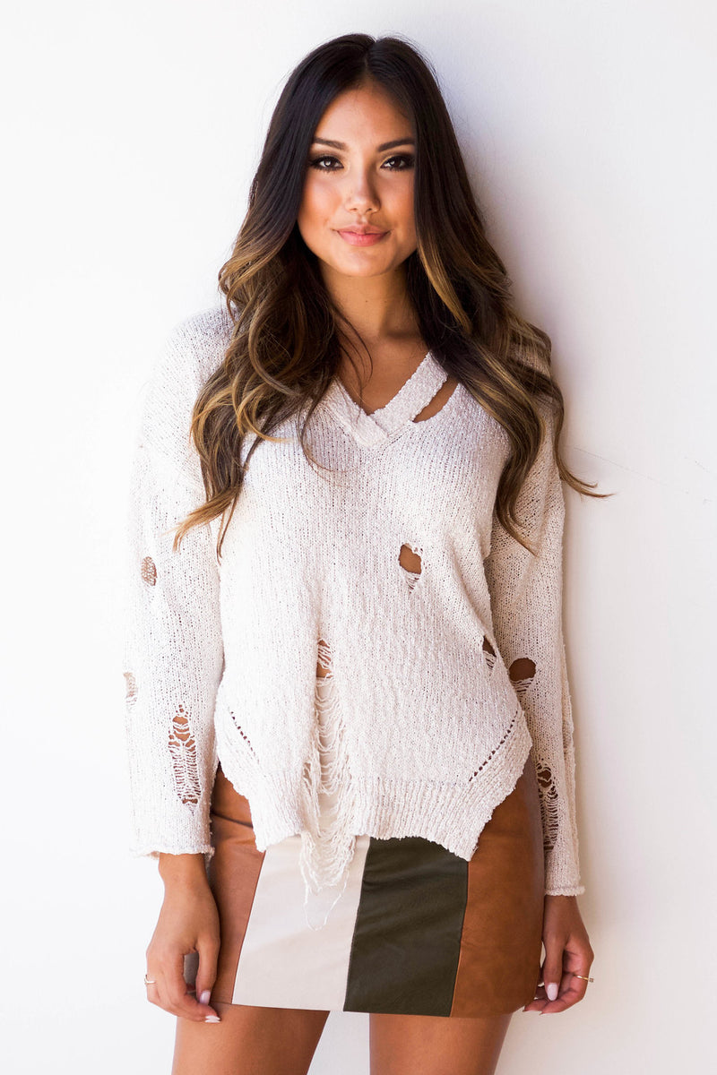 mode, not distraught sweater