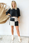 leather let me go mini skirt