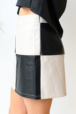 leather let me go mini skirt