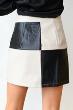 leather let me go mini skirt