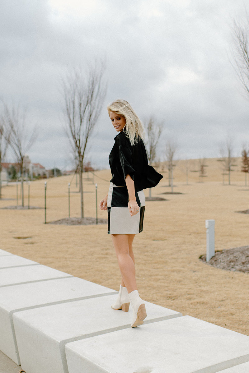 leather let me go mini skirt