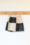 leather let me go mini skirt