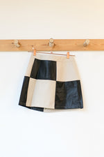 leather let me go mini skirt
