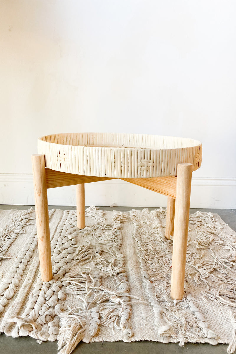 bamboo pedestal + rattan tray