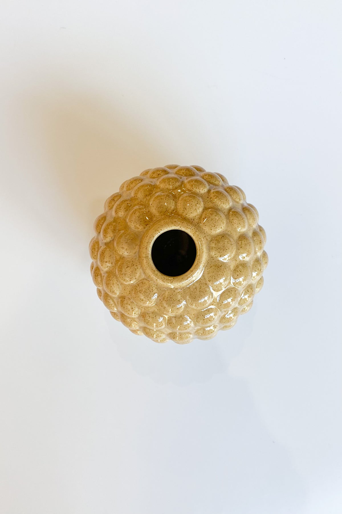 mode, round embossed stoneware vase