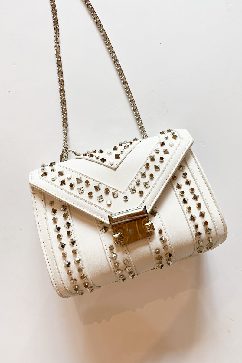 mode, studded leather clutch