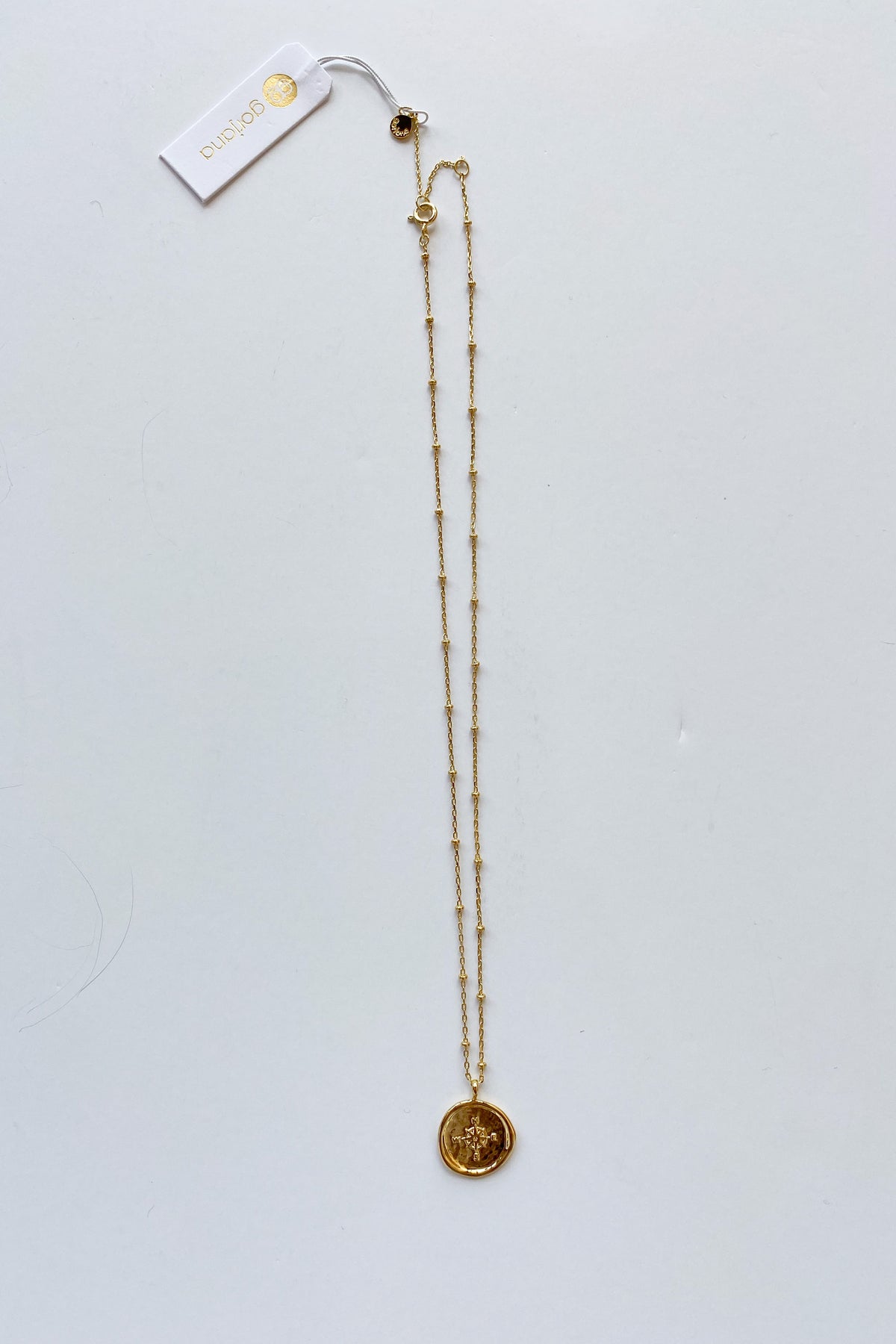 mode, compass coin necklace