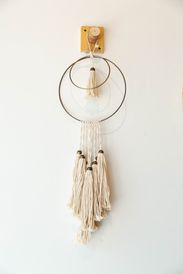 mode, cotton and metal wall hanging