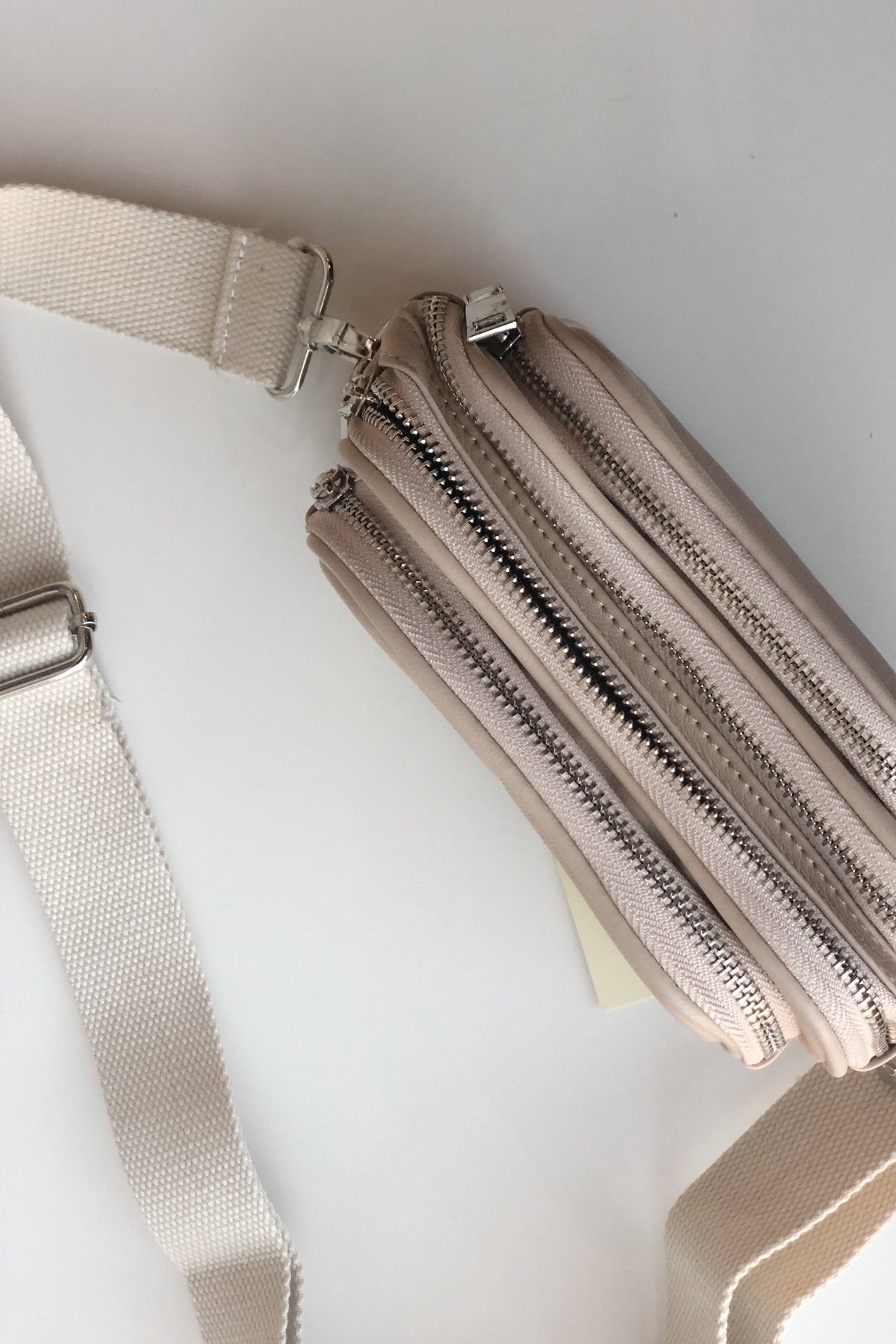 mode, zips cross body/fanny pack