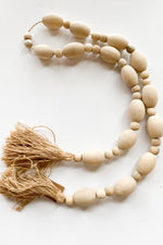 mode, mango wood tassel garland