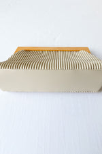 mode, delta clutch ivory