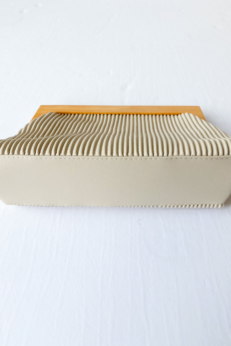 mode, delta clutch ivory
