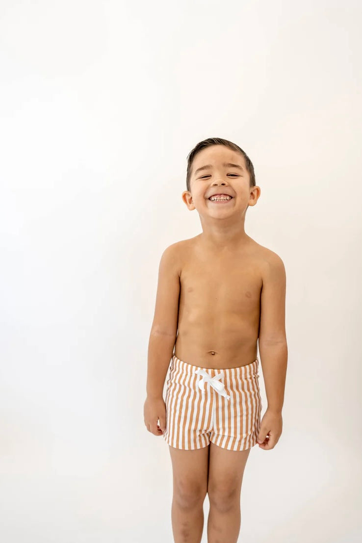 mode, striped swim shorts