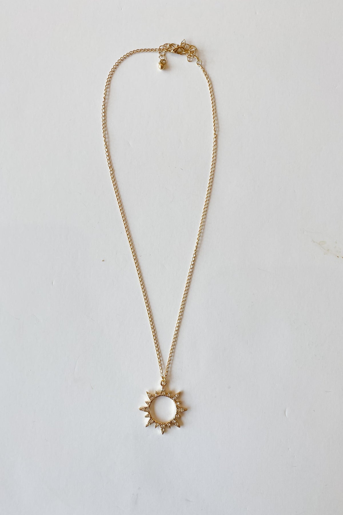 mode, sun rising necklace