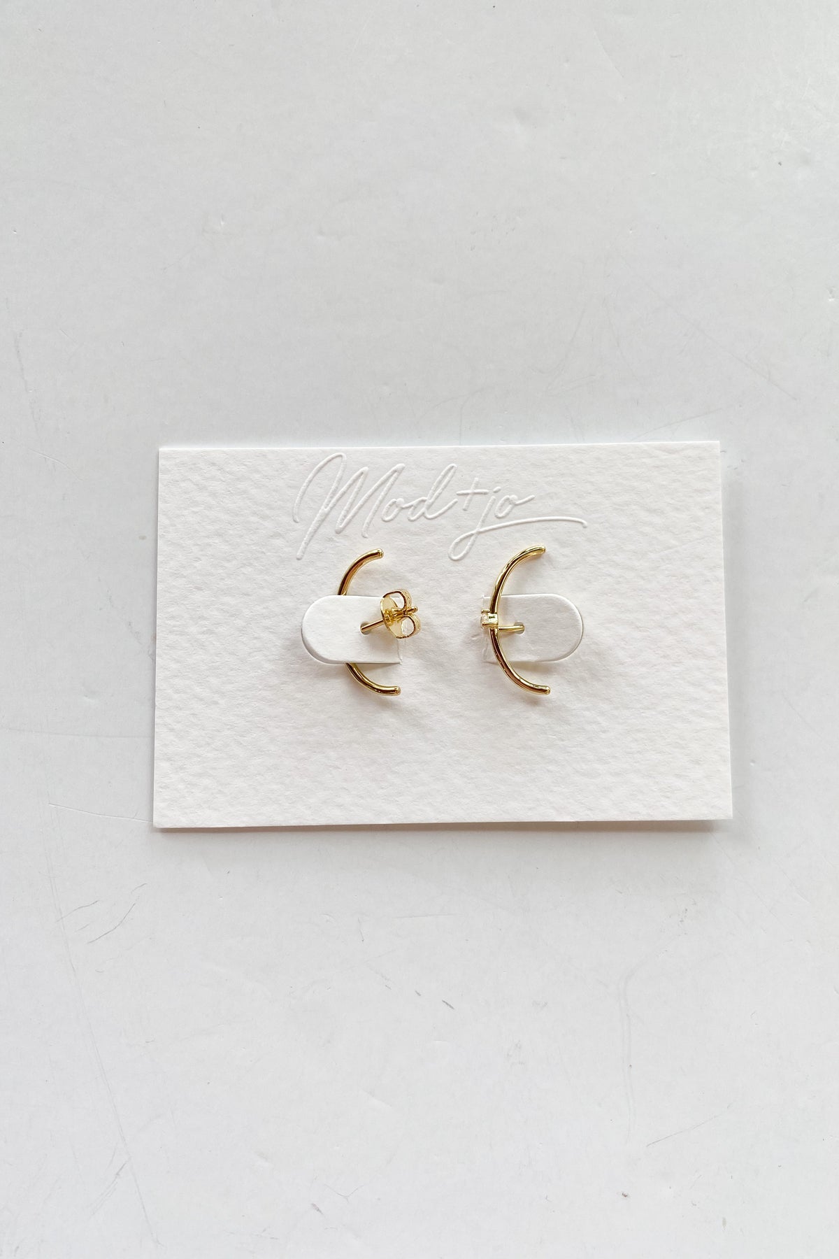 mode, gray wrap studs