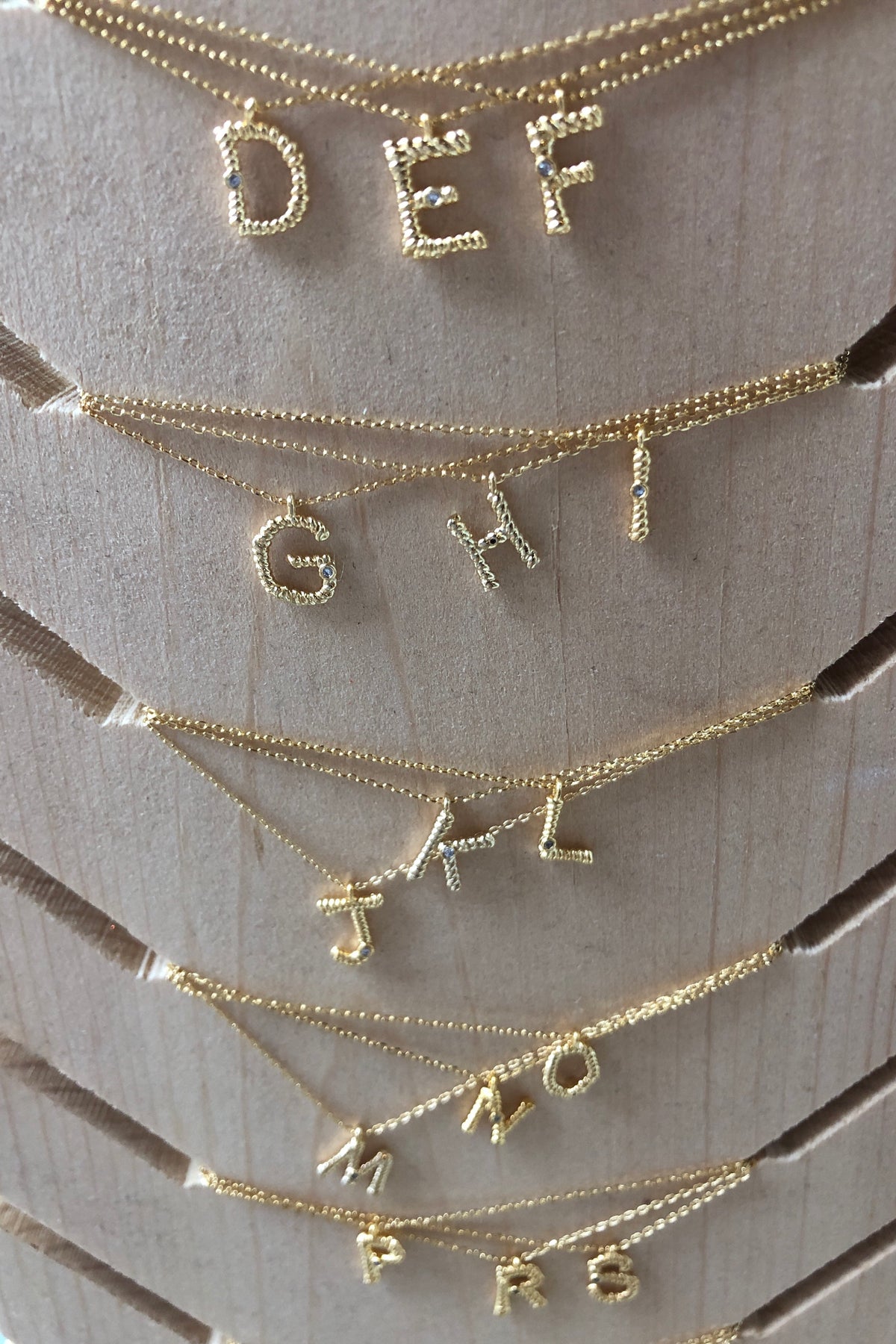 mode, sticks n stones initial necklace
