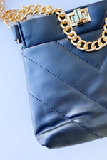 mode, never lose faith chain bag