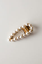 mode, sister of pearl clip