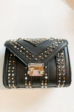 mode, studded leather clutch