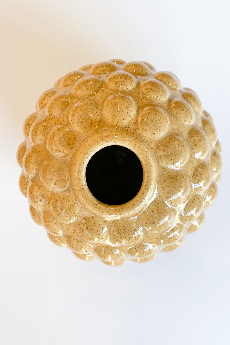 round embossed stoneware vase