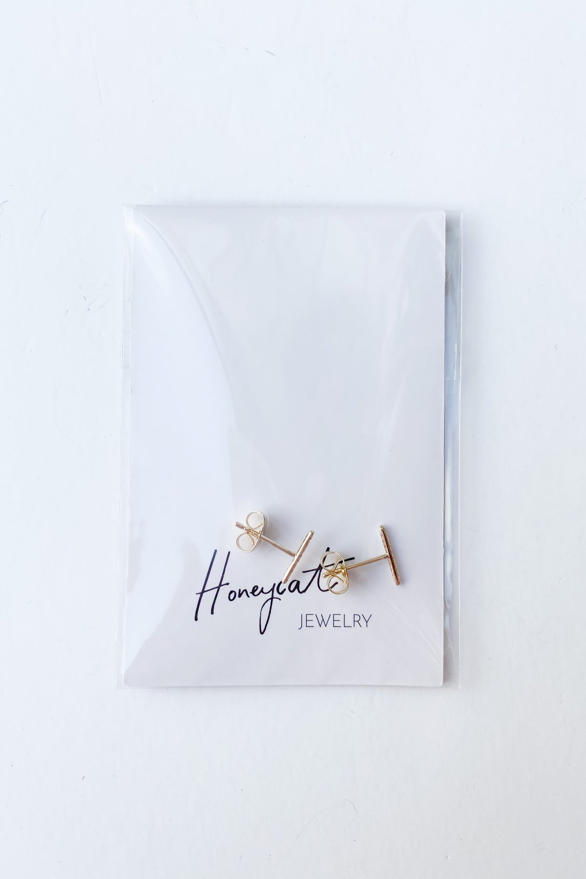 mode, skinny midi crystal bar earrings
