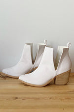 mode, whimsical side slit bootie