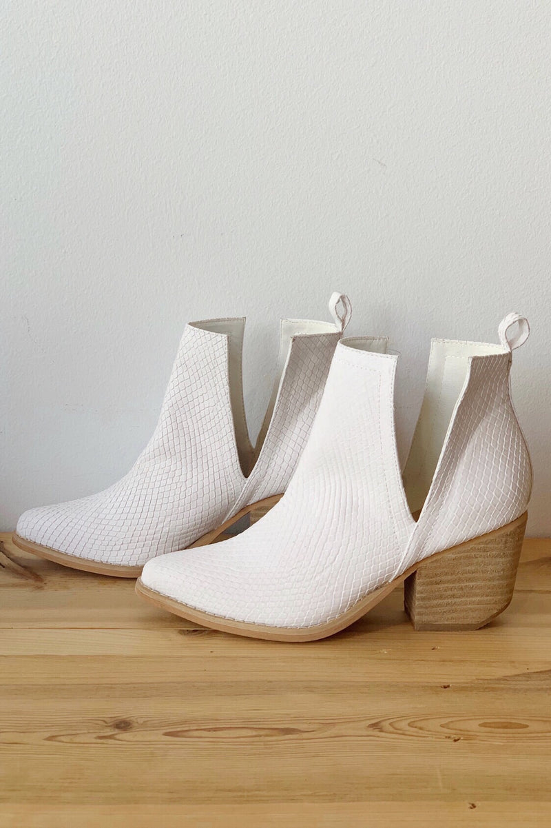 mode, whimsical side slit bootie