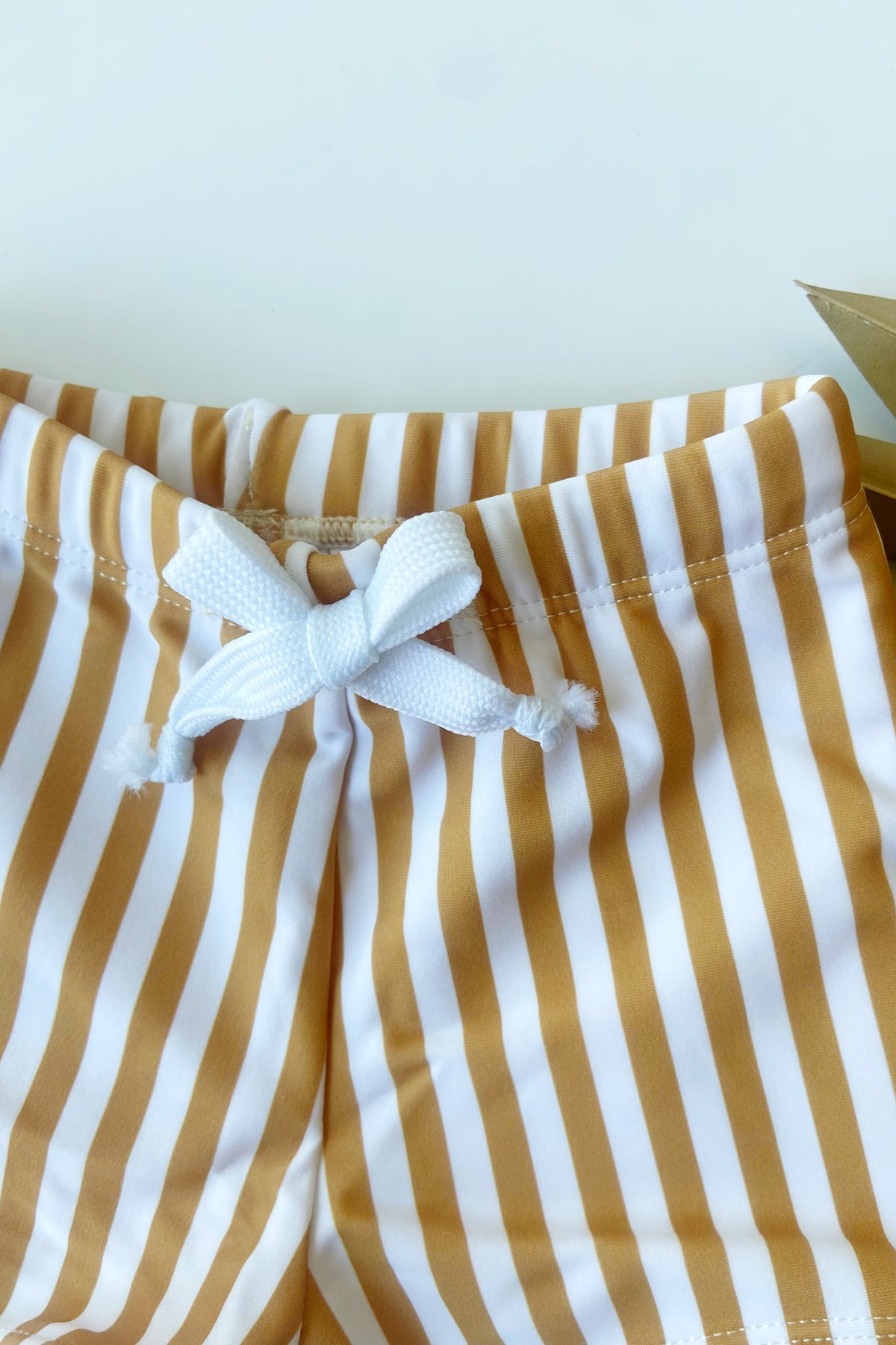 mode, striped swim shorts
