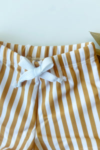 mode, striped swim shorts