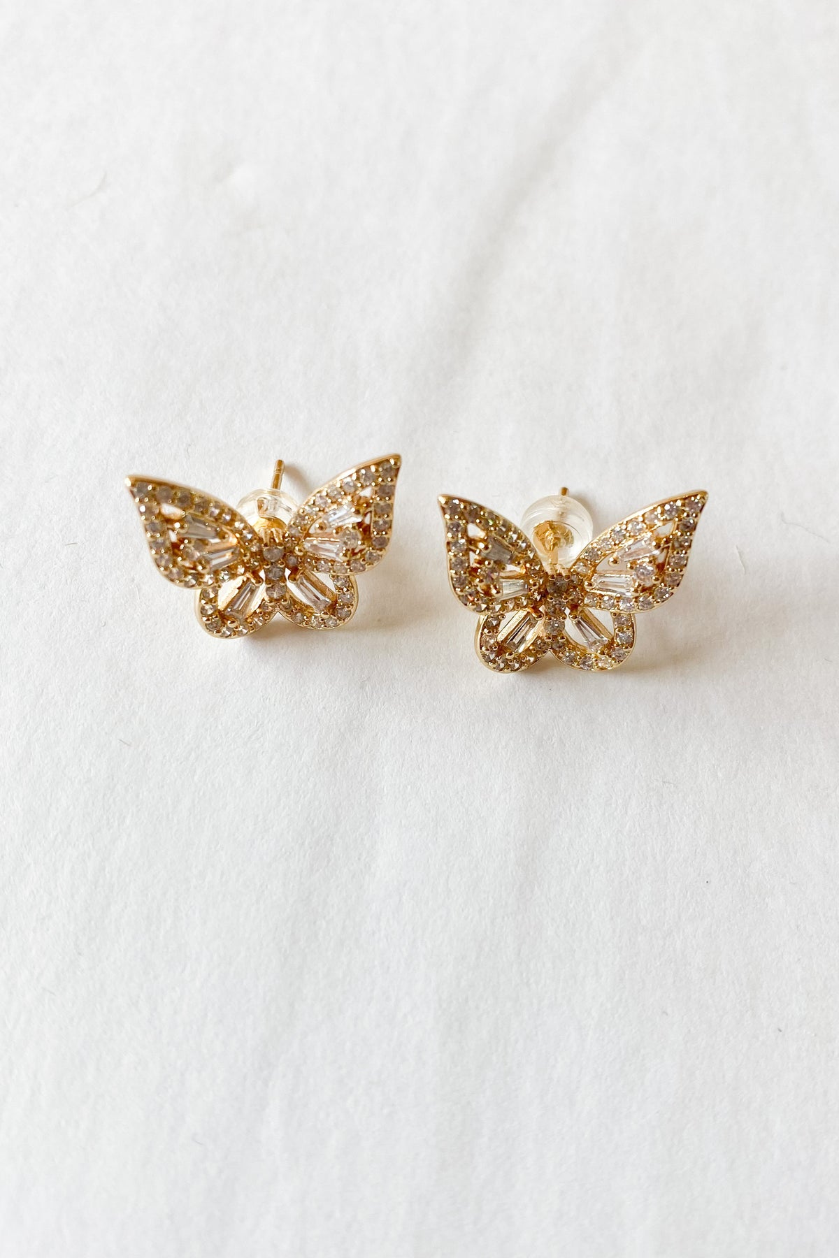 mode, iced out butterfly studs