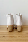 mode, whimsical side slit bootie