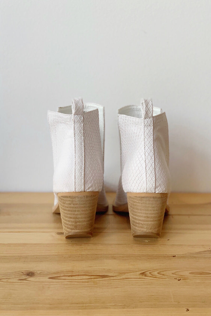 mode, whimsical side slit bootie