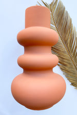 stoneware vase with latex glaze terracotta