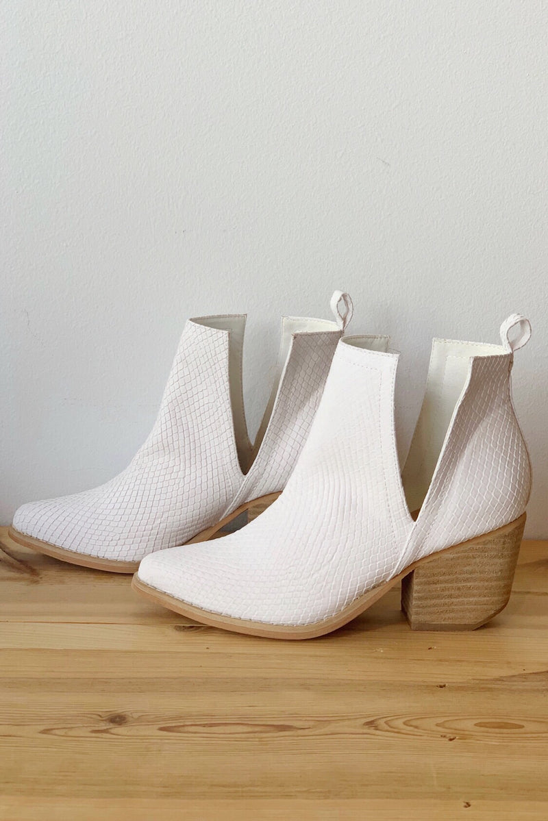 mode, whimsical side slit bootie