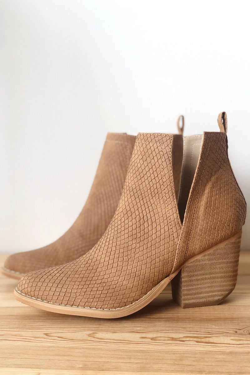 mode, whimsical side slit bootie