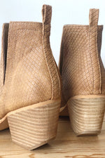 mode, whimsical side slit bootie