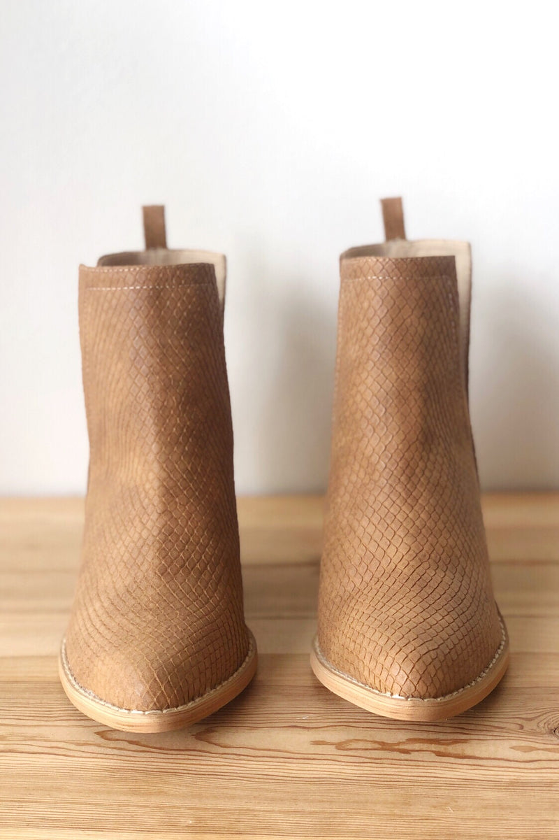 mode, whimsical side slit bootie