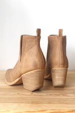 mode, whimsical side slit bootie